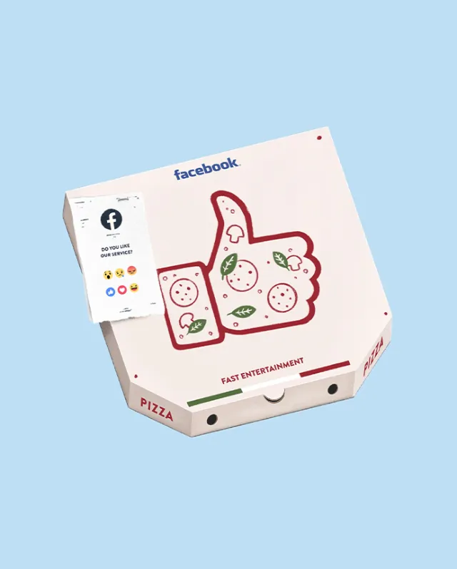 Pizza box with Facebook thumbs-up logo decorated with pizza toppings by Samy Löwe