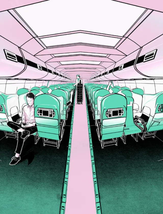 Airplane cabin interior with seats and passenger working on laptop by Davi Augusto