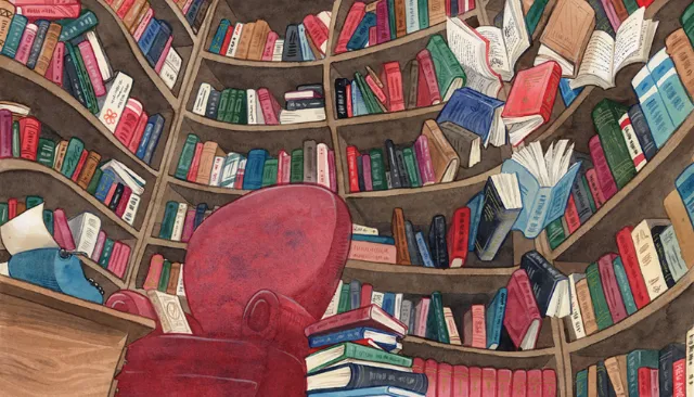 Red armchair in front of curved bookshelves full of books by Manu Cunhas