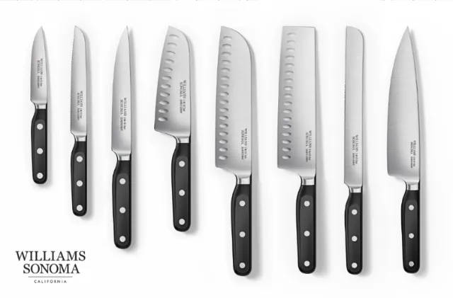 Eight stainless steel kitchen knives with black handles by CUBE