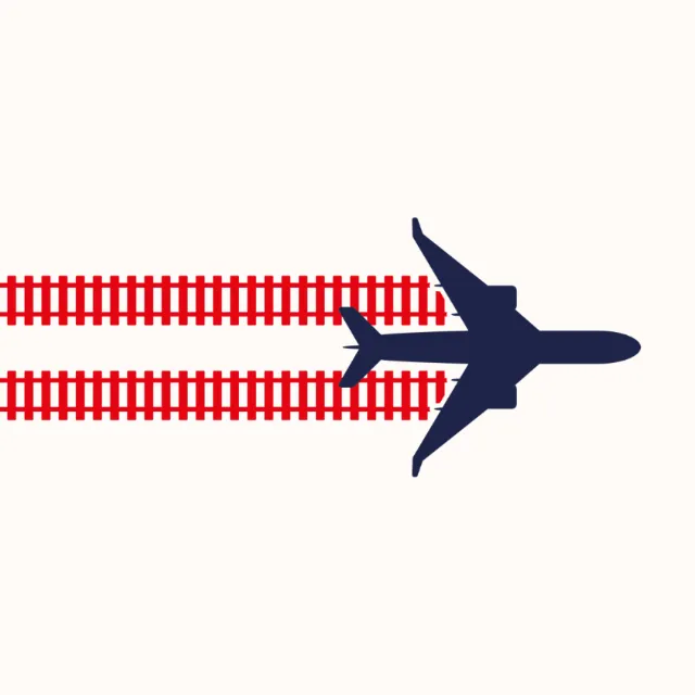 Silhouette of airplane flying above red train tracks by Tim Weiffenbach