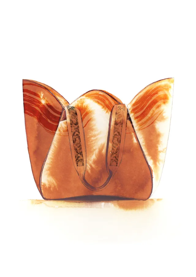 Brown leather handbag with curved design and intricate patterns by Petra Dufkova
