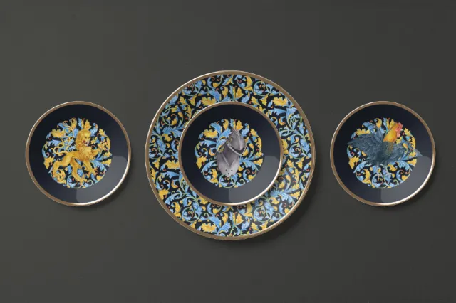 Decorative plates featuring intricate floral and animal designs by Svetlana Molodchenko