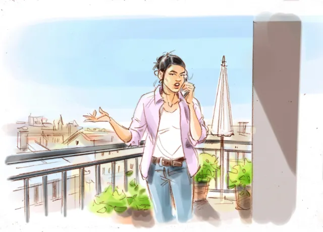 Young woman talking on phone on balcony with city background by Henryk Zimak