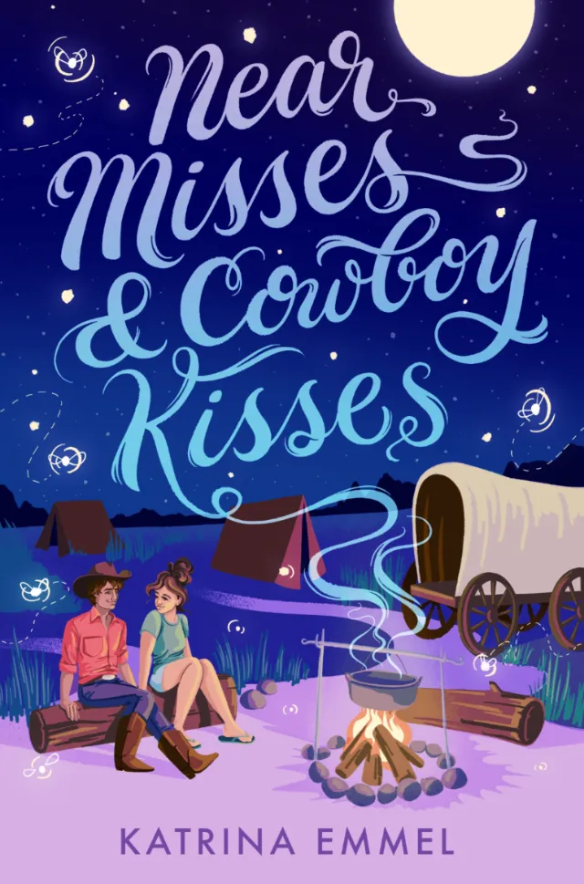 Young couple sitting by campfire under moon with covered wagon