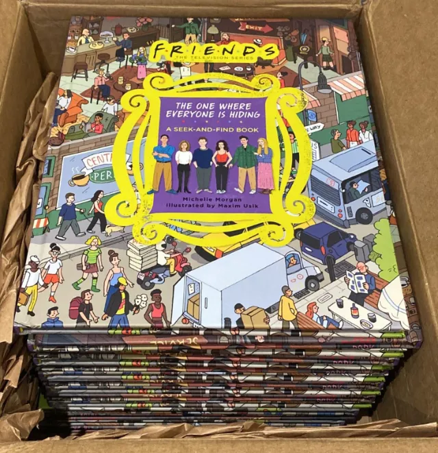 Friends seek-and-find book with cartoon city scene and characters