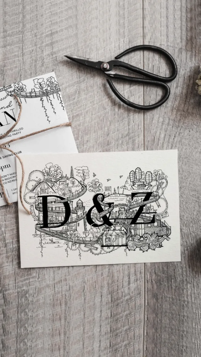 Wedding invitation card with D and Z initials and floral decorations