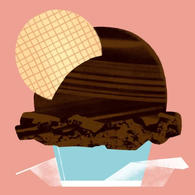 Chocolate gelato scoop with waffle wafer in blue cup on pink background
