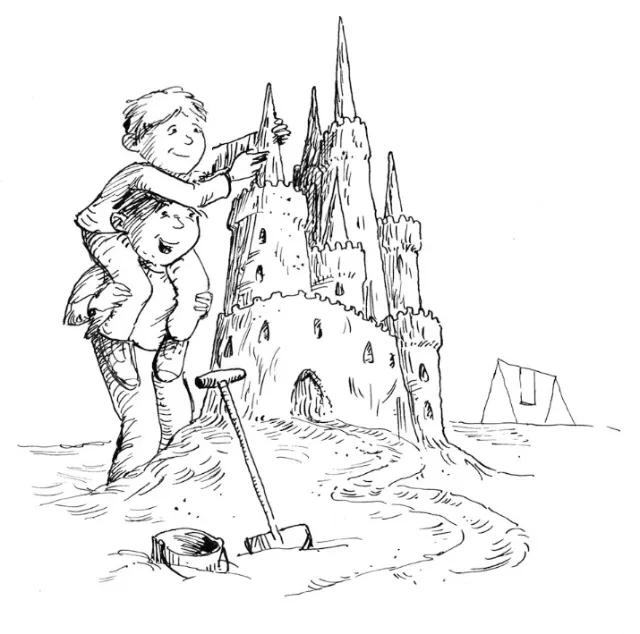 Two boys building a large sandcastle on the beach