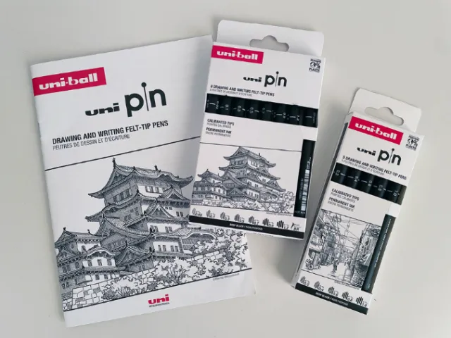 Uni-ball pin fine-tip pen sets with detailed building illustration