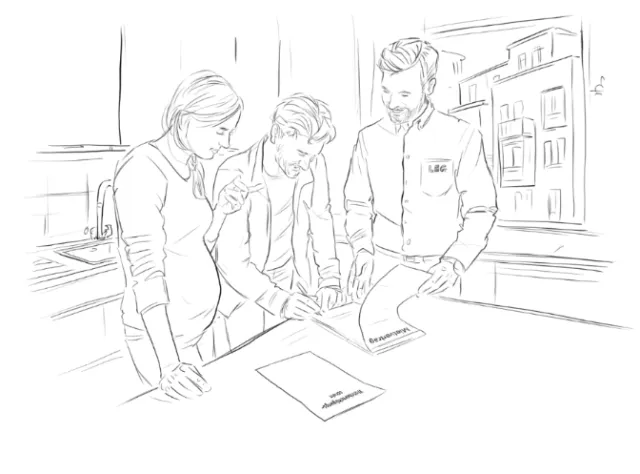 Three coworkers discussing papers in a modern office environment