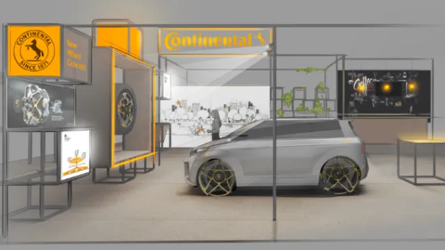 Electric concept car at Continental exhibit booth with branded displays