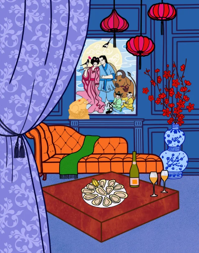 Living room with orange sofa, red lanterns, and a decorated table