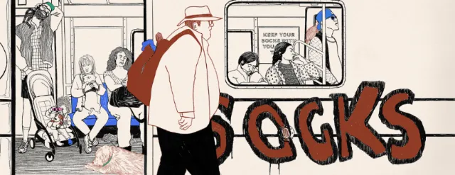 Man walking by a bus stop with large socks graffiti and seated people