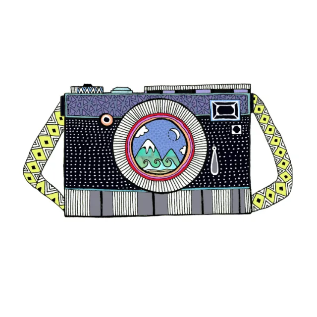 Illustration of a vintage camera with mountains inside the lens