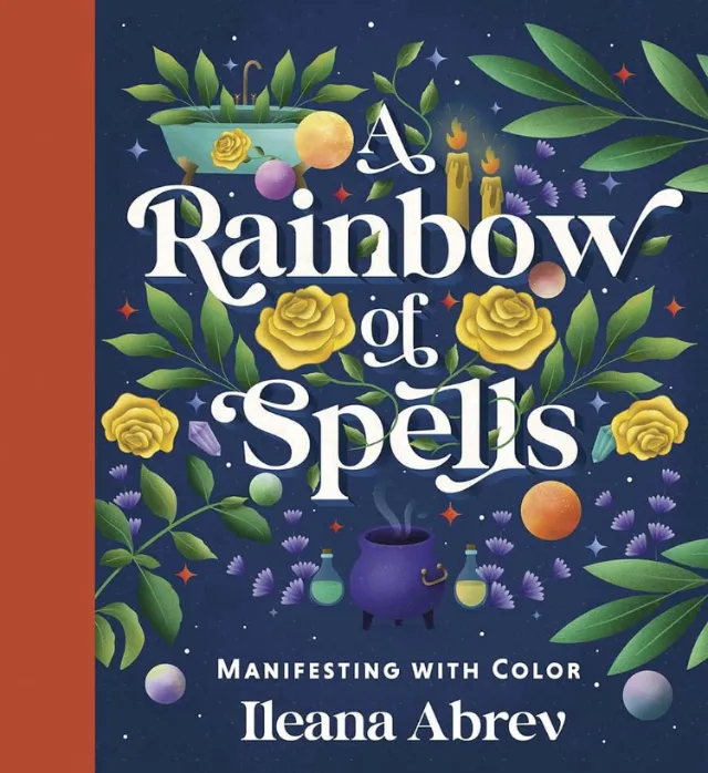 Book cover showing title A Rainbow of Spells with flowers, candles, and magical elements