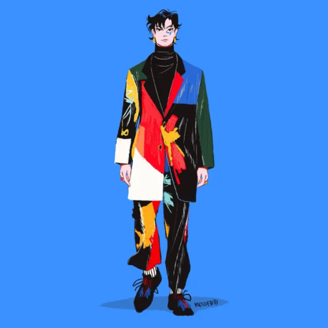 Male model in vibrant patchwork suit on blue background