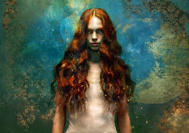 Portrait of a woman with long red hair against textured background