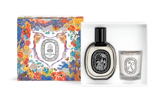 Fragrance bottle and rose candle in decorative floral gift box