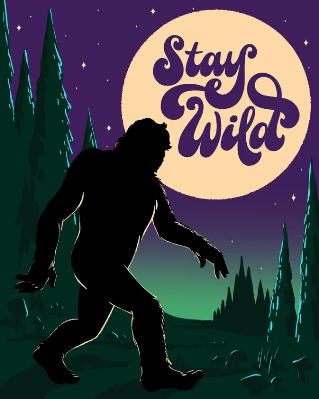Bigfoot silhouette walking in forest under full moon with Stay Wild text