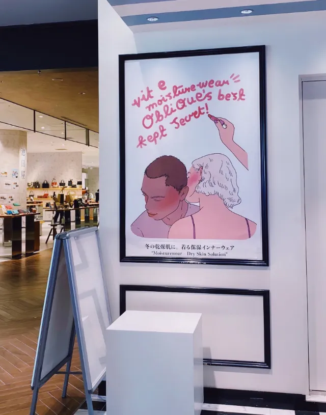 Woman whispering to man with handwritten message above them