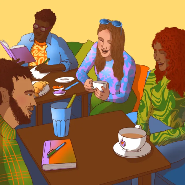 Four friends sitting around tables with drinks, reading and chatting