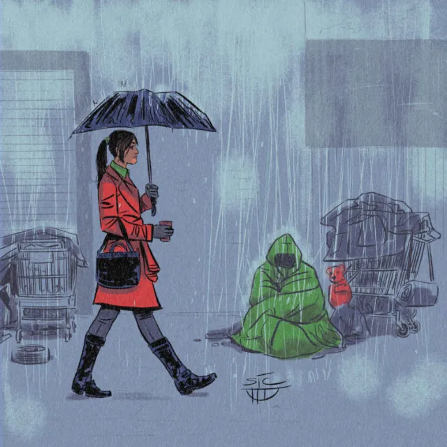 Woman walking in rain with umbrella past homeless person in green blanket