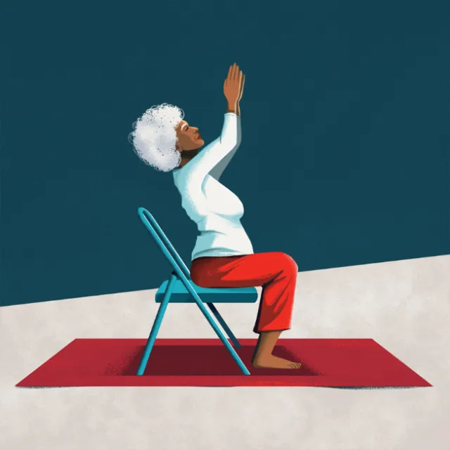 Elderly woman doing seated yoga stretch on chair and mat