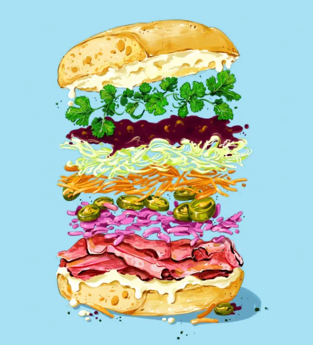 Layered sandwich with meat, cheese, jalapenos, and herbs on blue background