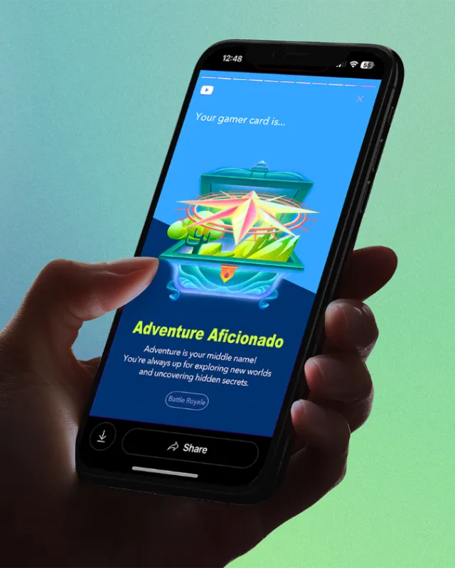 Smartphone screen showing Adventure Aficionado gaming achievement card