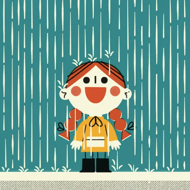 Smiling girl with red braids wearing a yellow raincoat in rain