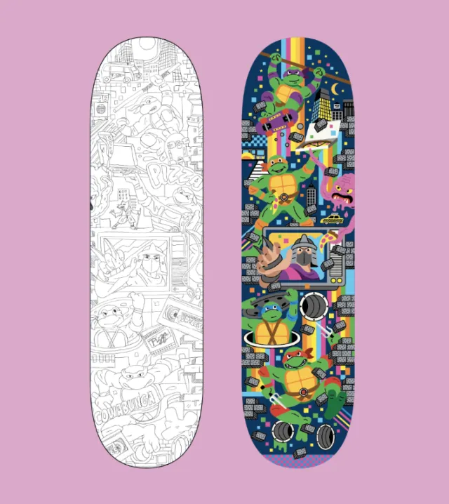 Two skateboard decks, one black and white line art, one colorful with cats in space suits.