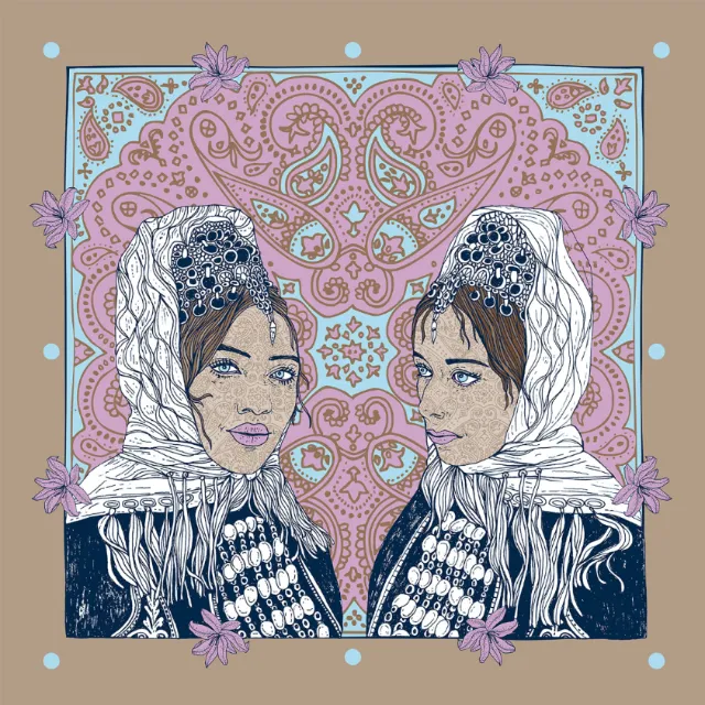 Two women wearing white headscarves with floral patterned background