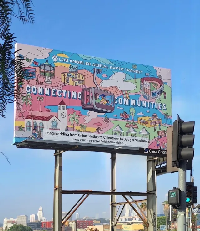 Colorful billboard illustration promoting tram to Dodger Stadium in Los Angeles