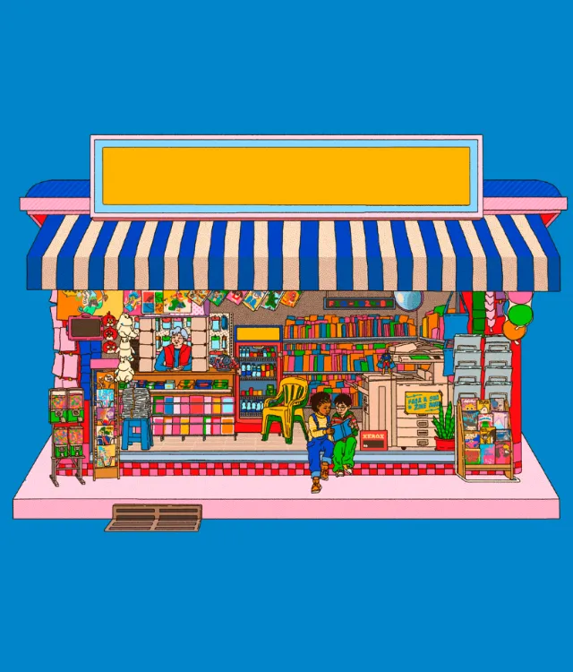 Colorful street bookstore with books and two people sitting outside