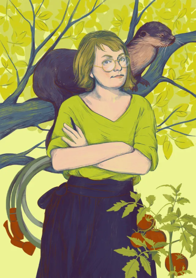 Woman standing with folded arms and otter on tree branch behind her