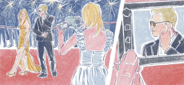 Photographers taking pictures of celebrities on red carpet