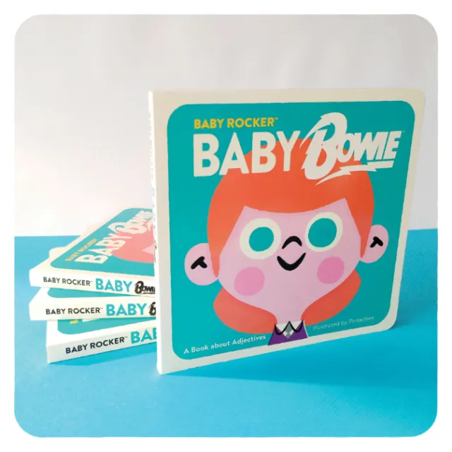 Stack of Baby Rocker books with cartoon character on blue background