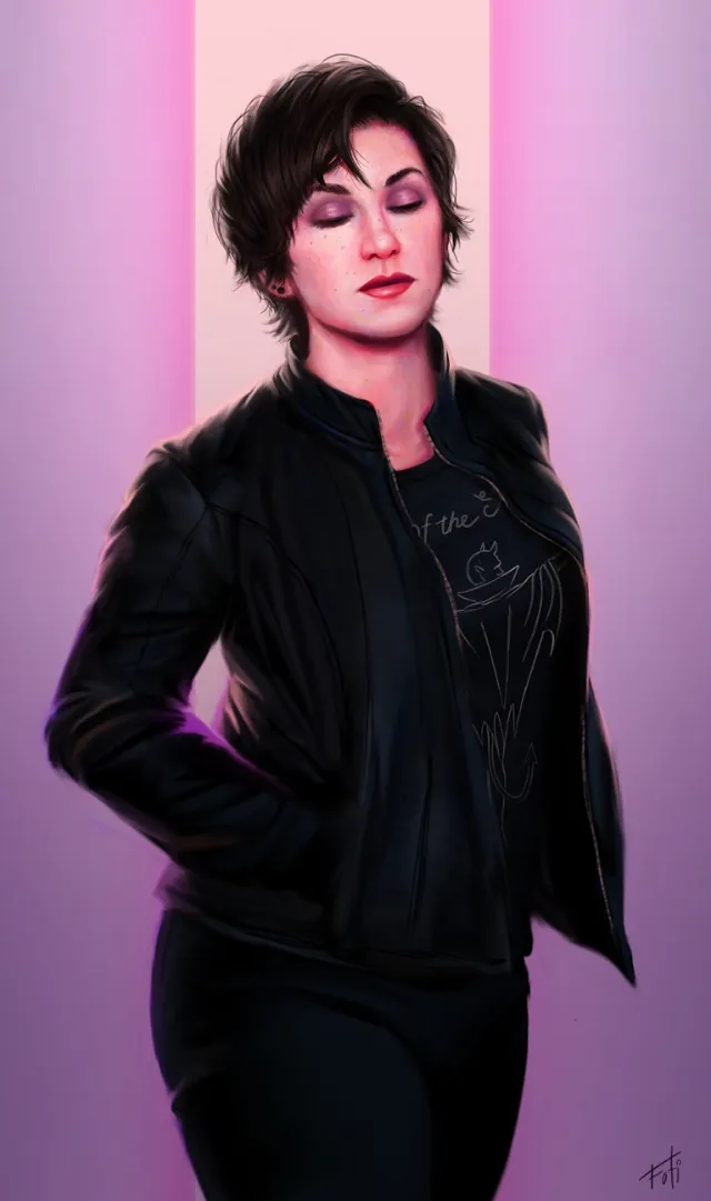 Portrait of woman with short dark hair wearing black jacket