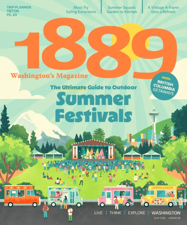 Outdoor summer festival with stage, crowd, food trucks, Seattle skyline