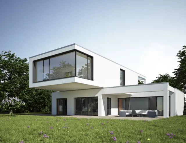 Modern white two-story house with large glass windows and outdoor seating