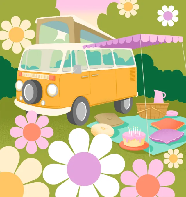 Vintage VW van with picnic setup and large flowers by Alissandra Seelaus