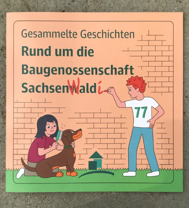 Two people with a dog near a brick wall with German text about Baugenossenschaft Sachsenwald.