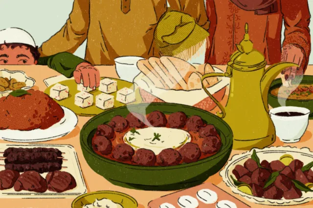 Traditional Middle Eastern meal with meatballs, rice, tea, and side dishes.