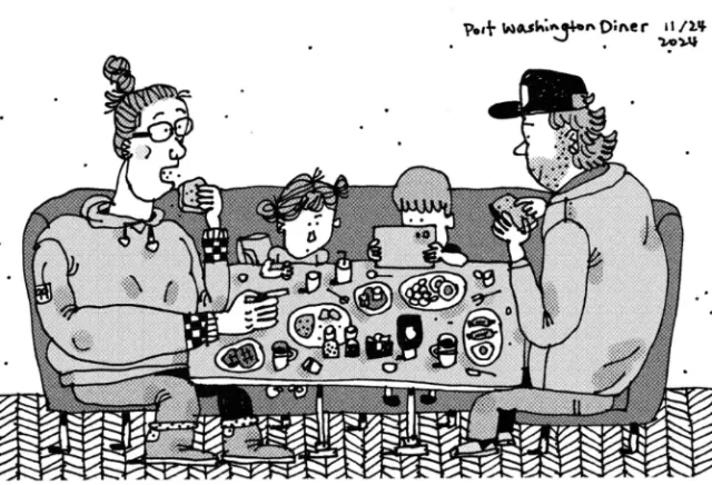 Family of four sitting around diner table eating and talking.