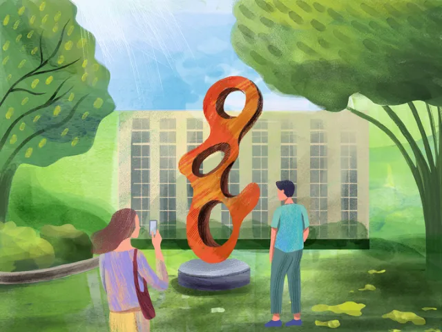 Two people looking at an orange abstract sculpture in a park by Li Zhang