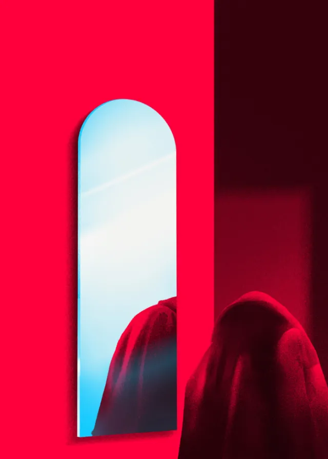 Red cloak reflected in tall arched mirror by Andrei Nicolescu
