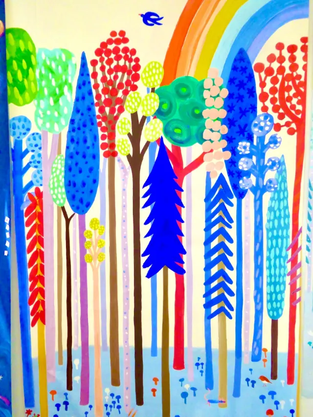 Whimsical colorful forest with rainbow and blue bird by Christopher Corr