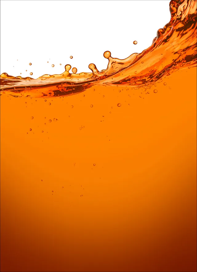 Close-up of orange wine splash with bubbles by artist CUBE