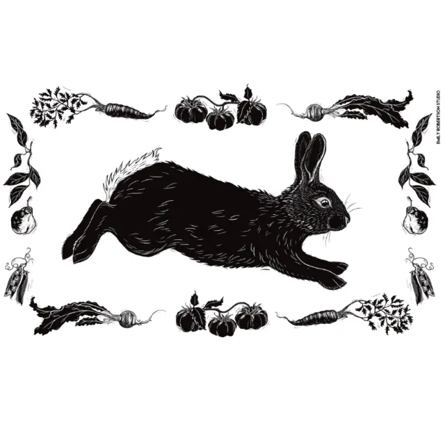 Black rabbit surrounded by vegetables on tea towel by Emily Robertson